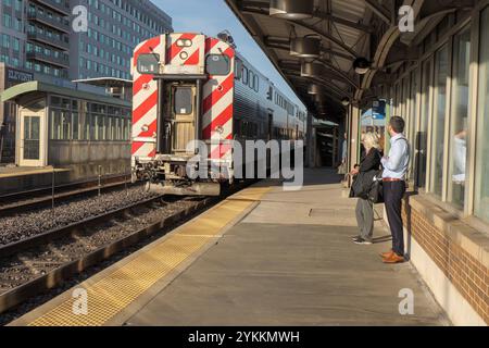 Inbound Metra Union Pacific West train arriving at the Oak Park, Illinois station. Stock Photo