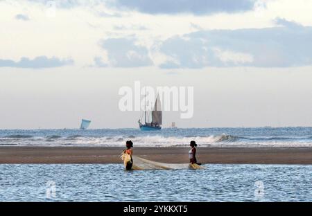 Malagasy women fishing in the Mozambique channel. Photo taken in Morondava, Madagascar. Stock Photo