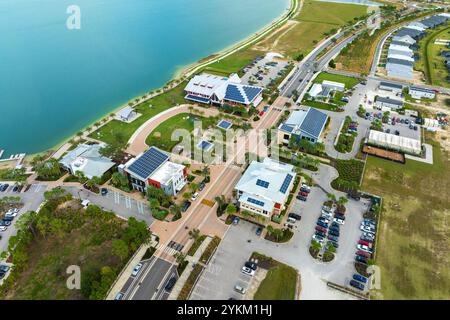 Solar photovoltaic panels installed on top of Florida office buildings for producing clean ecological electric energy. Renewable electricity with zero Stock Photo