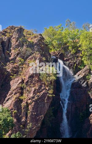 The Wangi Falls a popular swimming spot, has two misty waterfalls filling the huge swimming hole. The waterfalls create a natural plunge pool in the r Stock Photo