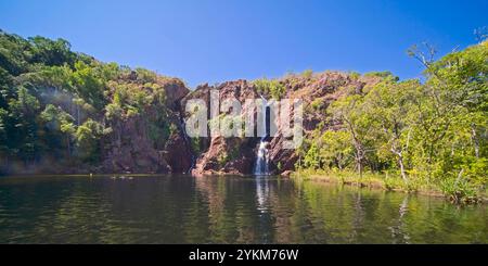 The Wangi Falls a popular swimming spot, has two misty waterfalls filling the huge swimming hole. The waterfalls create a natural plunge pool in the r Stock Photo