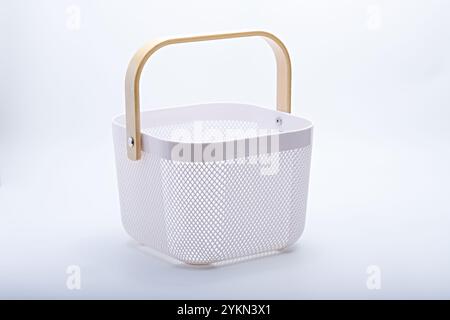 White basket photographed against a light background Stock Photo
