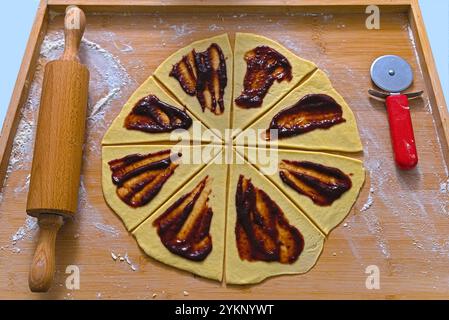Preparing Fruit-Filled Croissants Stock Photo