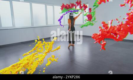 Creative Asian female artist in augmented reality headset paints with wireless controllers, uses gestures to create abstract online concept art. Holographic 3D graphics of paint drops. VFX animation. Stock Photo