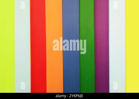 Vibrant multi-colored vertical striped wooden wall Stock Photo