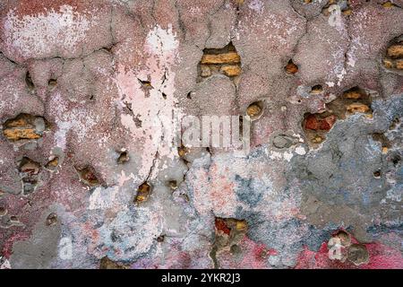 Old cracked grunge cement, brick and mortar wall. Stock Photo