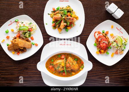 Yorkshire, UK – 13 June 2019 : delicious Indian food including chicken tikka, curried duck and spiced prawns  from The Mogul Room, Barnsley Stock Photo