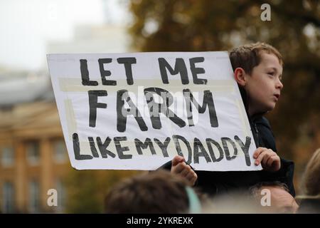 London, UK, 19th November 2024. Farmers protest against Labour's inheritance tax change in Westminster. A little boy holding a placard. Credit: Uwe Deffner / Alamy Live News. Stock Photo