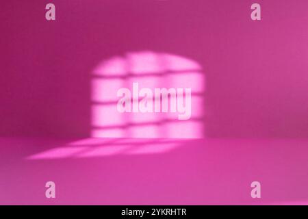 Abstract magenta studio background with sun light trails, Backdrop with shadows of a window for product display   paper texture Stock Photo