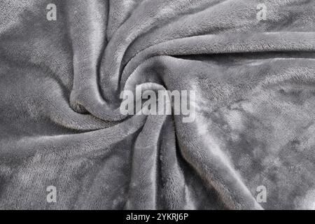 Fleece gray blanket with swirl waves and fiber texture, abstract fashionable Stock Photo