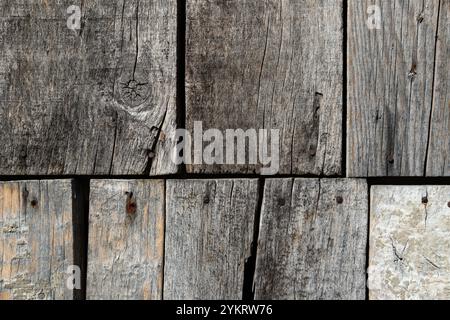 Old board nailed with rusty nails, wood texture on old building Stock Photo