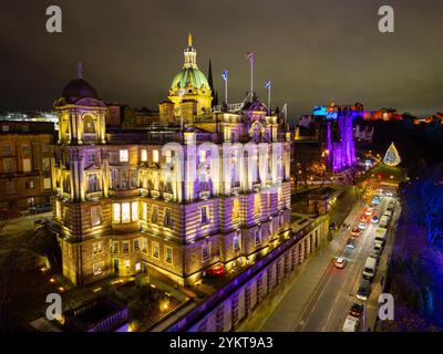 Aerial view at night of illuminated former headquarters of Bank of Scotland on The Mound in Edinburgh, Scotland, UK Stock Photo