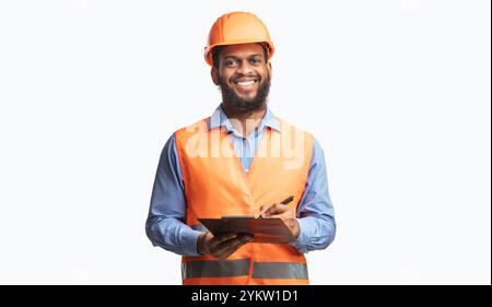 Happy Construction Worker Guy Taking Notes Holding Folder, Studio Shot Stock Photo