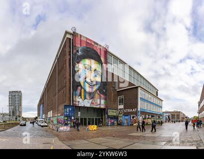 A picture of the Let Me Be Myself colorful mural, depicting Anne Frank, created by Eduardo Kobra in 2016, on the wall of the STRAAT Museum Stock Photo