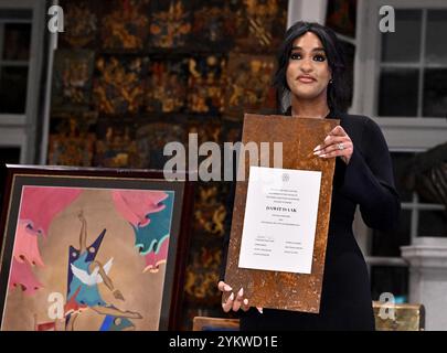 Stockholm, Sweden. 19th Nov, 2024. Betlehem Isaak, daughter of Dawit Isaak, receives the Edelstamp Prize 2024 on behalf of her father The Edelstamp Prize is awarded to Dawit Isaak for his outstanding efforts and exceptional courage in standing up for freedom of expression, his convictions and the defense of human rights. The prize is awarded at a ceremony at Riddarhuset in Stockholm, Sweden 19 November 2024.Photo: Claudio Bresciani/TT/Code 10090 Credit: TT News Agency/Alamy Live News Stock Photo