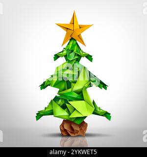Creative Holiday Greeting as origami Christmas celebration as a winter pine tree concept for arts and crafts as a greeting card design with paper boat Stock Photo