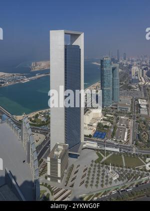 A picture of the Abu Dhabi National Oil Company Headquarters, while the St. Regis Abu Dhabi Hotel sits at the far right Stock Photo