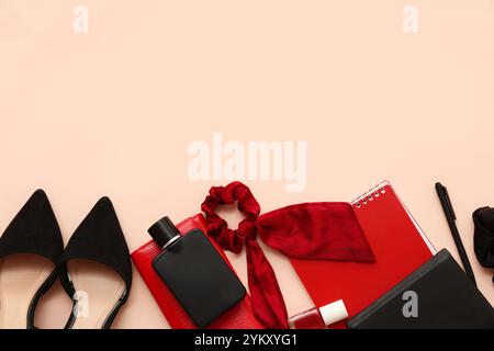 Composition with stylish female accessories, shoes and notebooks on color background Stock Photo
