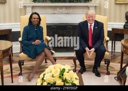 President Donald Trump meets with former Secretary of State Condoleezza Rice in the Oval Office, Friday, March 31, 2017. (Official White House photo by D. Myles Cullen) Stock Photo