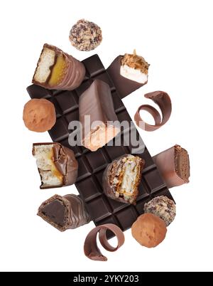 Different chocolate products in air on white background Stock Photo