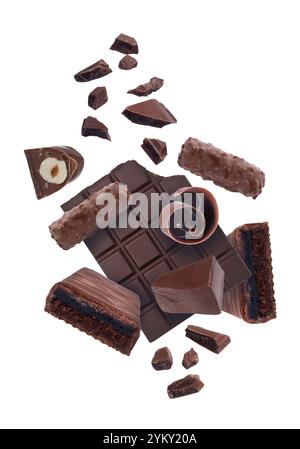 Different chocolate products in air on white background Stock Photo