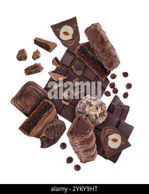 Different chocolate products in air on white background Stock Photo