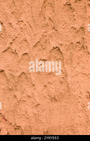 Vertical close-up photo of rough plaster. Stock Photo