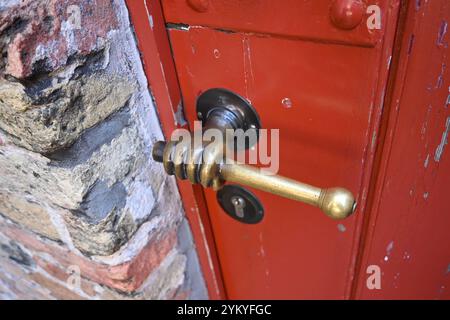 Hand shaped door handle – Bruges, Belgium – 23 October 2024 Stock Photo