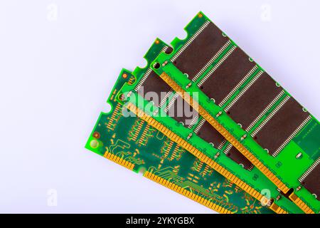View of multiple RAM modules displayed on light surface, highlighting intricate circuit patterns memory chip arrangements, emphasizing technology engineering. Stock Photo