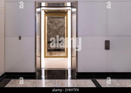 modern elevator with open door, buttons on the wall Stock Photo