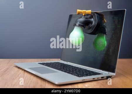 A laptop and a faucet with binary code. Data leaks and cybersecurity concept. Stock Photo