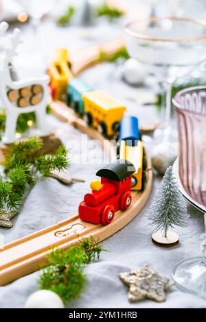 Traditional festive place setting for Christmas, glasses of sparkling wine Stock Photo