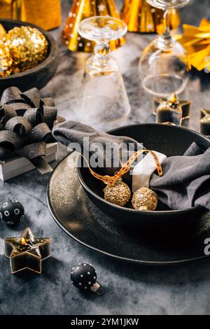 Elegant place setting for Christmas, New Years Eve, glasses of sparkling wine Stock Photo