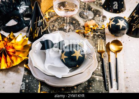 Elegant place setting for Christmas, New Years Eve, glasses of sparkling wine Stock Photo