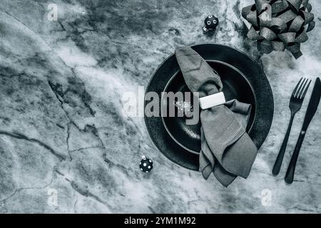 Elegant place setting for Christmas, New Years Eve in black tone Stock Photo