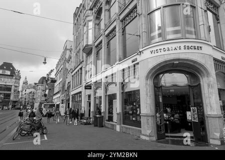 Amsterdam, NL - OCT 14, 2021: Street view and generic architecture in Amsterdam with typical Dutch style buildings. Amsterdam is one of Europe's most Stock Photo