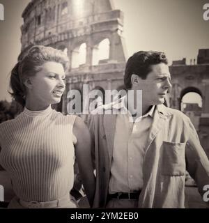 Italian filmstar Marcello Mastroianni with the Italian filmstar Sophia Loren on the set of  Too Bad She's Bad 1955 Stock Photo