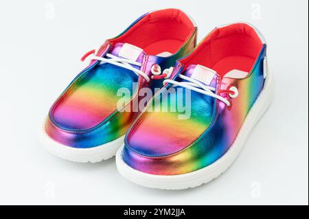 Perspective view on rainbow loafer shoes isolated on white studio background Stock Photo