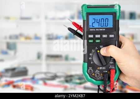 Digital Multimeter in Laboratory Setting Measuring Voltage Stock Photo