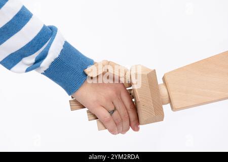 The handshake between humans and robots symbolizes collaboration and unity in todays world Stock Photo
