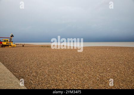 Aldeburgh, Suffolk, 20th November 2024, After a sunny start this Morning storm clouds appeared over the sea causing sleet with a temperature of 4C in Aldeburgh, Suffolk. Feeling seasonal there was a Christmas tree on the beach waiting to be decorated. The forecast is for more cold weather for the next few days. Credit: Keith Larby/Ģ����ý Live News Stock Photo