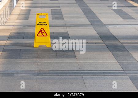 In Process Warning Sign Sign showing warning of cleaning process area, Yellow sign that alerts ...
