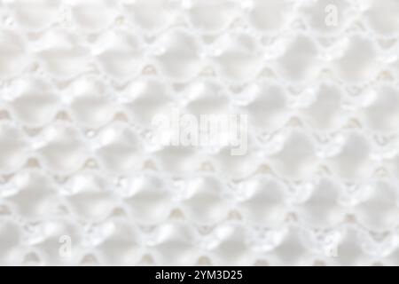 Blur close up plastic translucent air packaging, Plastic translucent packaging with air cushion. Inflatable air bag isolated on white background. Stock Photo