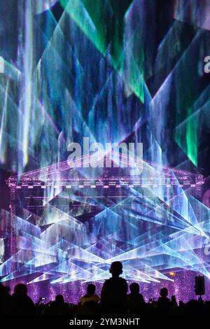 Spectacular bright open air laser show performance at the city festival Stock Photo