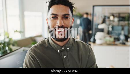 Portrait, man and programmer with smile in office of web development, software maintenance and coding. Male developer, confidence and computer for Stock Photo
