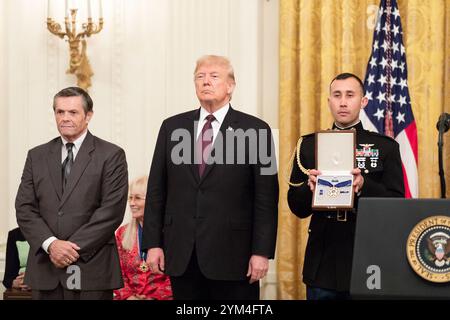 President Donald J. Trump presents the Medal of Freedom to Thomas Stevens who accepted the medal posthumously on behalf of his grandfather Babe Ruth Friday, Nov. 16, 2018, in the East Room of the White House (White House photo) Stock Photo