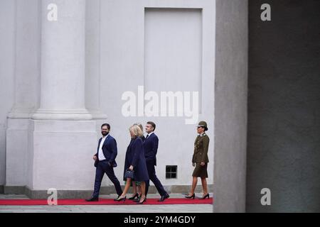 Santiago, Metropolitana, Chile. 20th Nov, 2024. Chile's President Gabriel Boric, left, takes a walk with France's President Emmanuel Macron, center, on his visit to La Moneda presidential palace in Santiago, Chile. (Credit Image: © Matias Basualdo/ZUMA Press Wire) EDITORIAL USAGE ONLY! Not for Commercial USAGE! Stock Photo