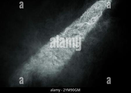 Light shining through powder smoke Stock Photo - Alamy