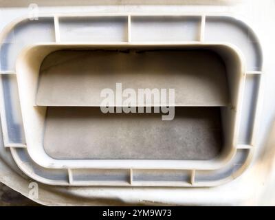Rear vents of a at the back of a car is to release air pressure. As air comes in through the front of the car via the heater or air conditioner, or th Stock Photo