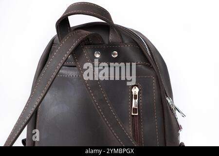 Leather women's backpack on a white background isolate. Leather bags and backpacks. Stock Photo